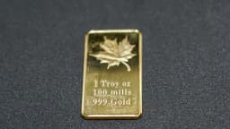 Photo of a 1 ounce gold bar